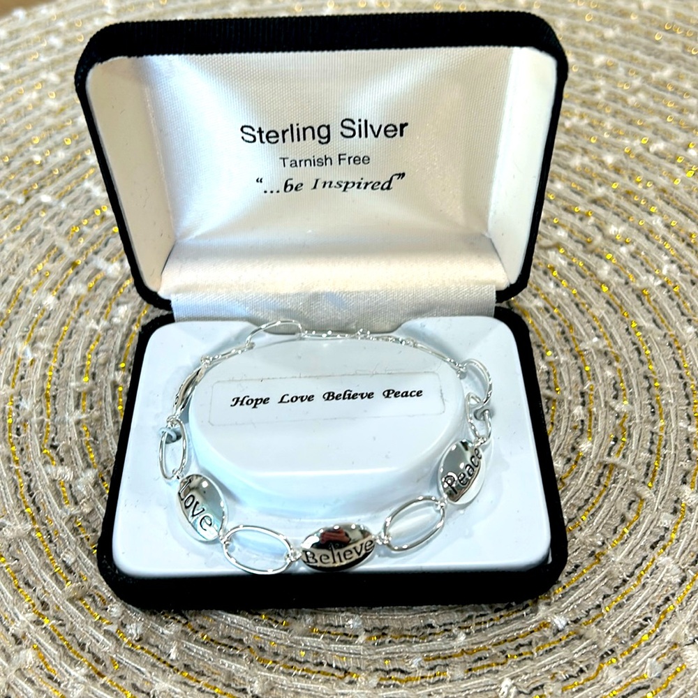 Stewing silver “be inspired” bracelet